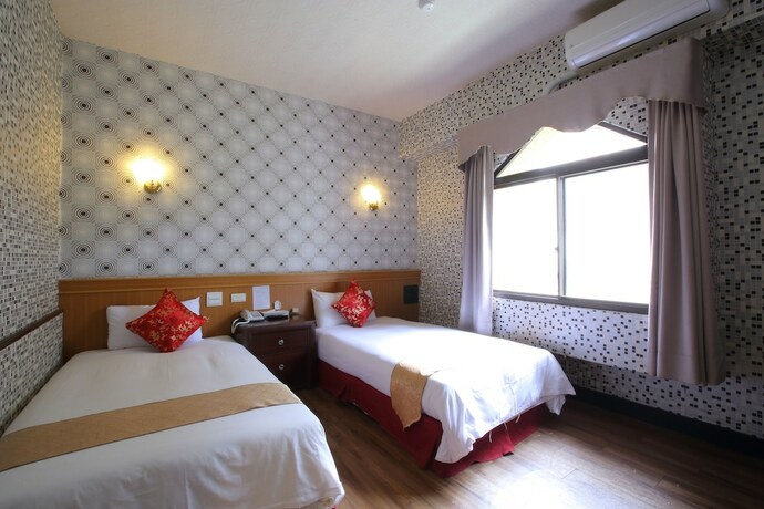 Imagen de la habitación del Hotel Chiayi Crown. Foto 16