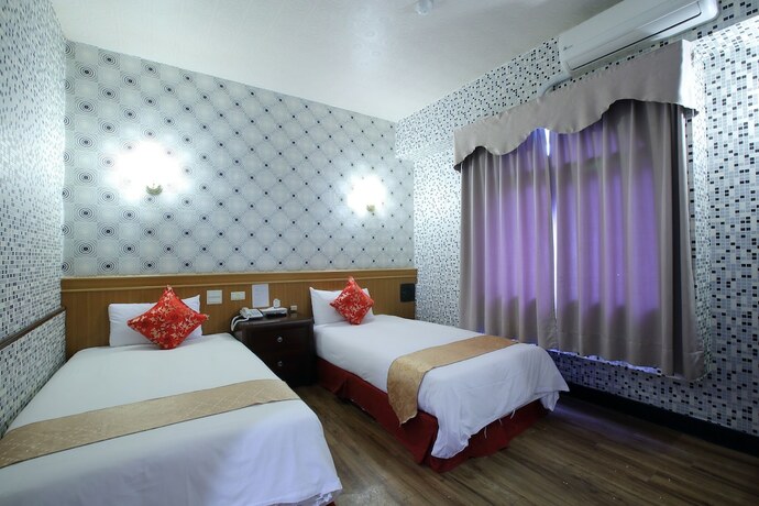 Imagen de la habitación del Hotel Chiayi Crown. Foto 18