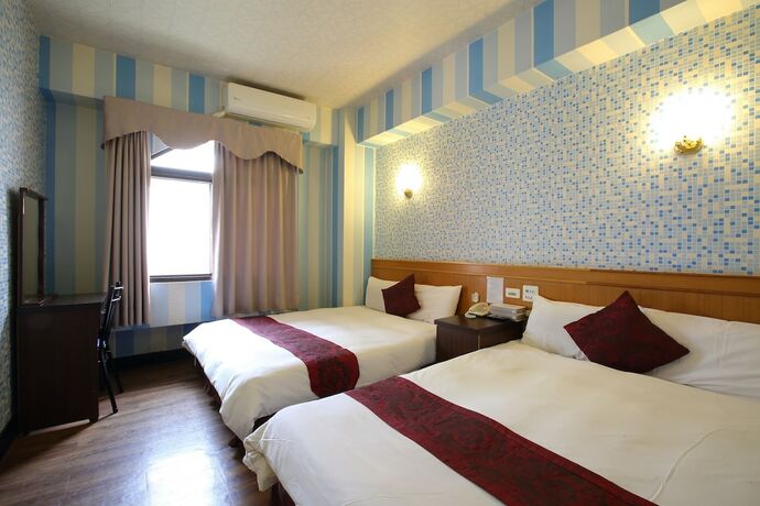 Imagen de la habitación del Hotel Chiayi Crown. Foto 19