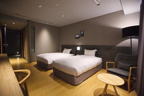 Imagen de la habitación del Hotel Chiayi Guanzhi. Foto 7
