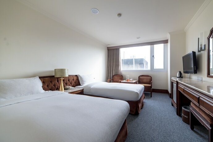 Imagen de la habitación del Hotel Chiayi King. Foto 14