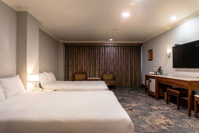 Imagen de la habitación del Hotel Chiayi King. Foto 17