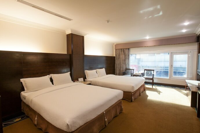 Imagen de la habitación del Hotel Chiayi King. Foto 18