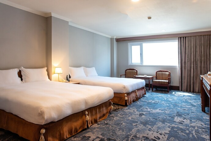 Imagen de la habitación del Hotel Chiayi King. Foto 25