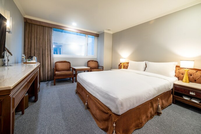 Imagen de la habitación del Hotel Chiayi King. Foto 30
