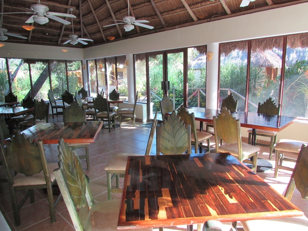 Imagen del bar/restaurante del Hotel Chicanná Ecovillage Resort. Foto 8