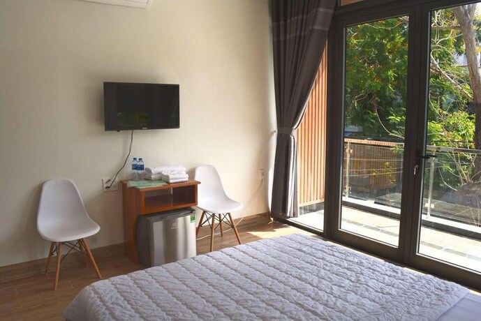 Imagen de la habitación del Hotel Chichi House. Foto 21