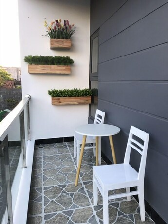 Imagen de la habitación del Hotel Chichi House. Foto 32