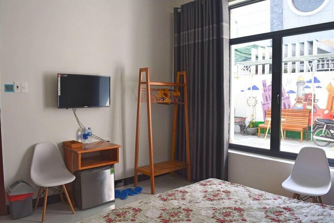 Imagen de la habitación del Hotel Chichi House. Foto 34