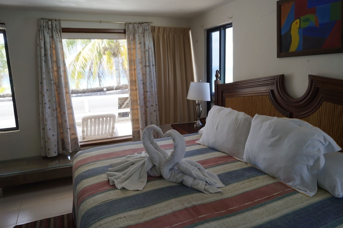 Imagen de la habitación del Hotel Chichis and Charlies Beachfront. Foto 5