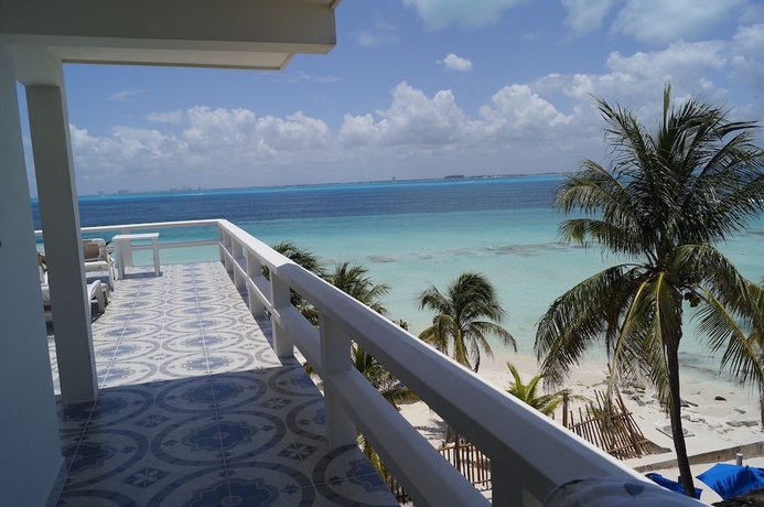 Imagen de la habitación del Hotel Chichis and Charlies Beachfront. Foto 12