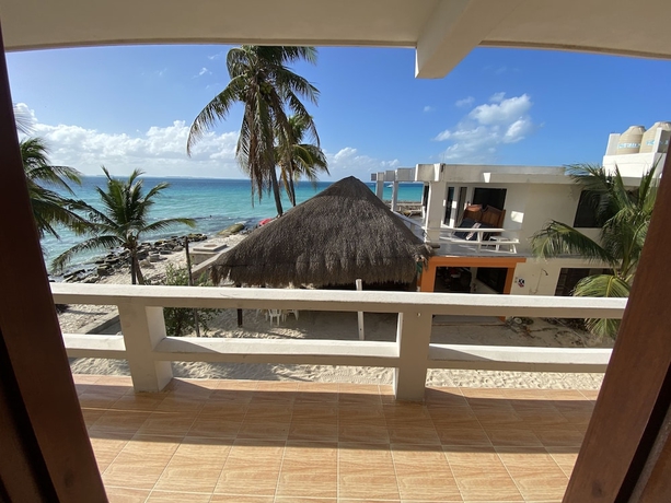 Imagen de la habitación del Hotel Chichis and Charlies Beachfront. Foto 14