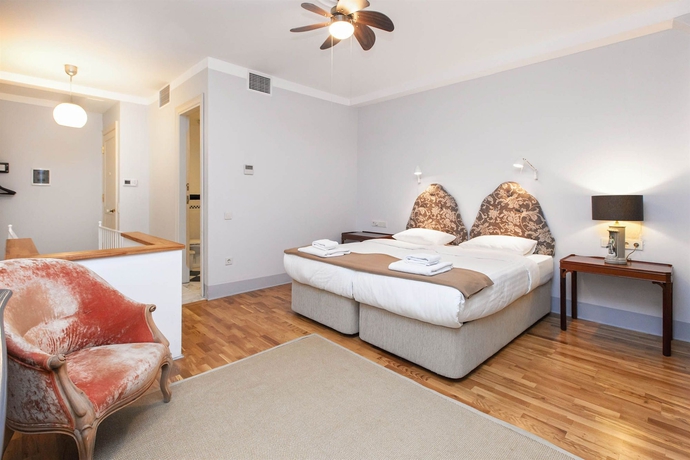 Imagen de la habitación del Hotel Chiconomy Suites. Foto 7