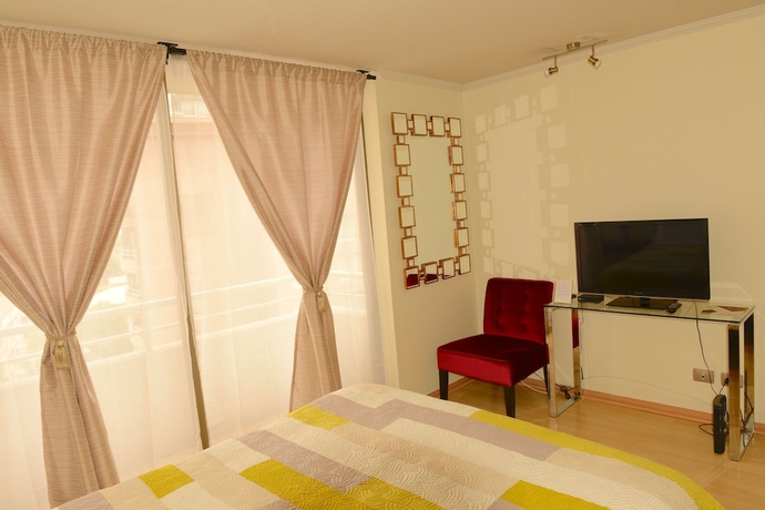 Imagen de la habitación del Hotel Chilean Suites Providencia. Foto 8