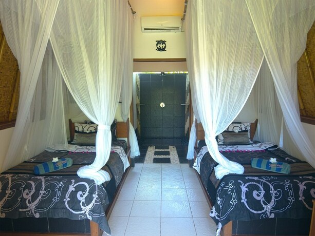 Imagen de la habitación del Hotel Chill Out Bungalows. Foto 24