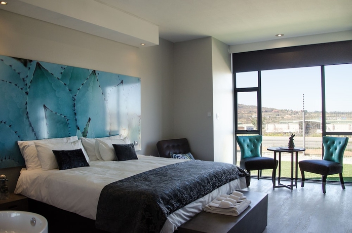 Imagen de la habitación del Hotel Chill Pepper Boutique. Foto 8