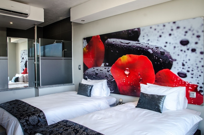 Imagen de la habitación del Hotel Chill Pepper Boutique. Foto 10