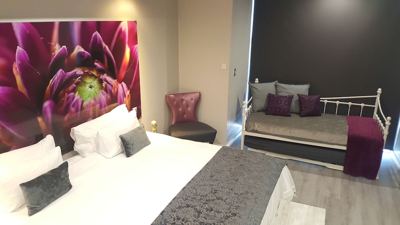Imagen de la habitación del Hotel Chill Pepper Boutique. Foto 13