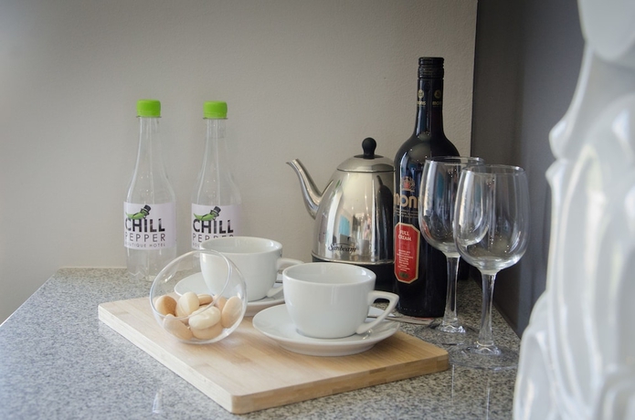 Imagen de la habitación del Hotel Chill Pepper Boutique. Foto 15