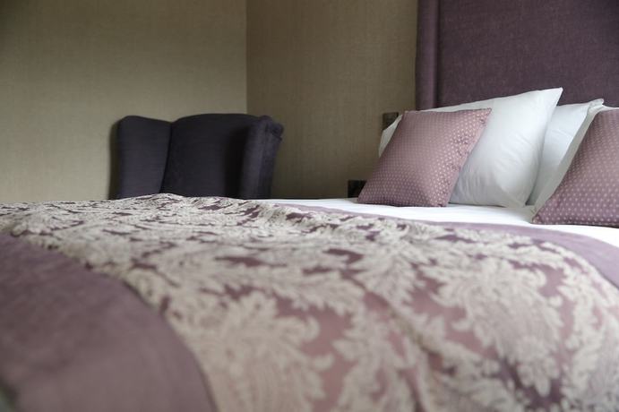 Imagen de la habitación del Hotel Chimney Corner. Foto 7