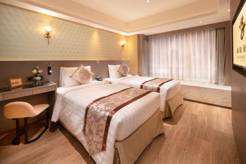 Imagen de la habitación del Hotel China Dragon. Foto 7