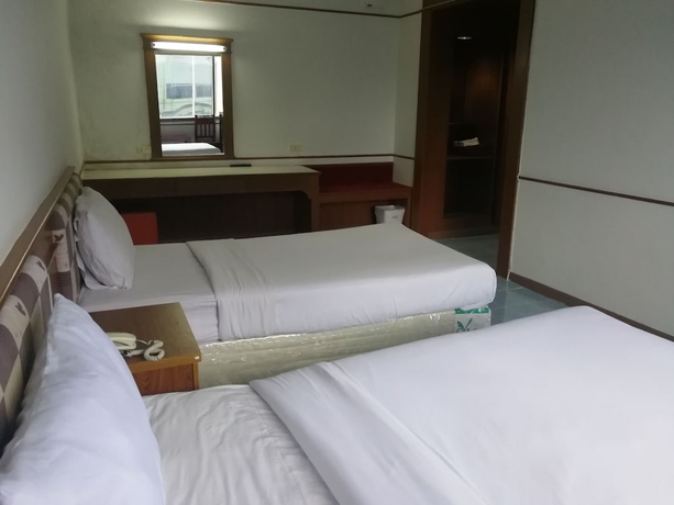 Imagen de la habitación del Hotel China Garden. Foto 6