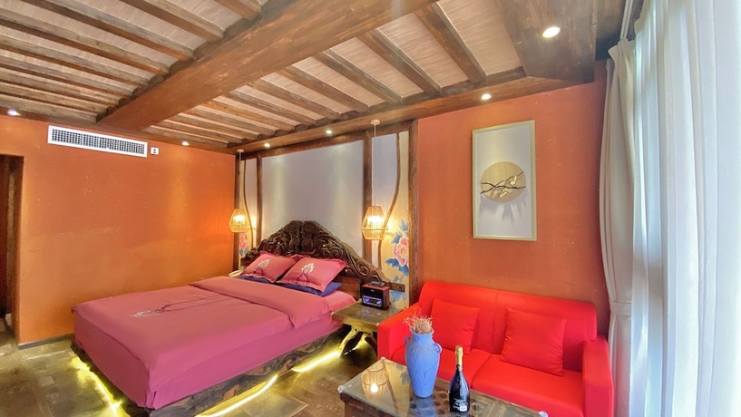 Imagen de la habitación del Hotel China Old Story Inn Lijiang Elite Garden. Foto 3