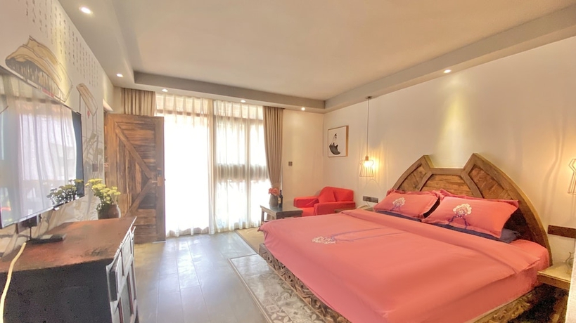 Imagen de la habitación del Hotel China Old Story Inn Lijiang Elite Garden. Foto 5