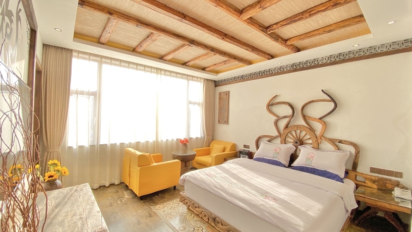 Imagen de la habitación del Hotel China Old Story Inn Lijiang Elite Garden. Foto 10