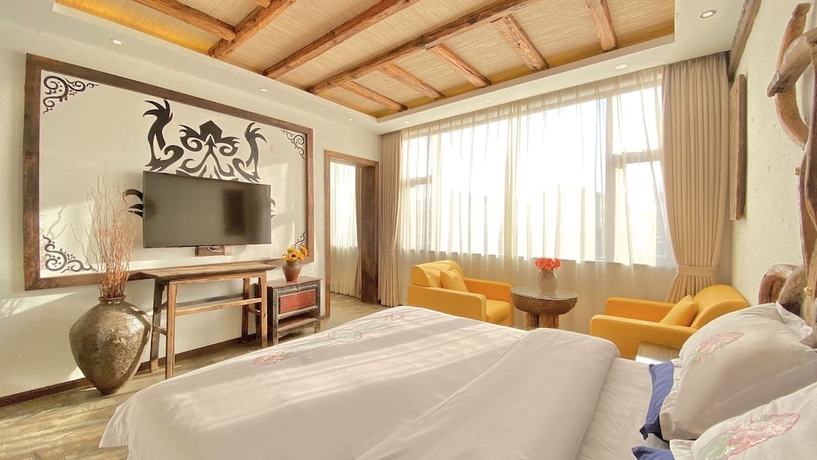 Imagen de la habitación del Hotel China Old Story Inn Lijiang Elite Garden. Foto 11