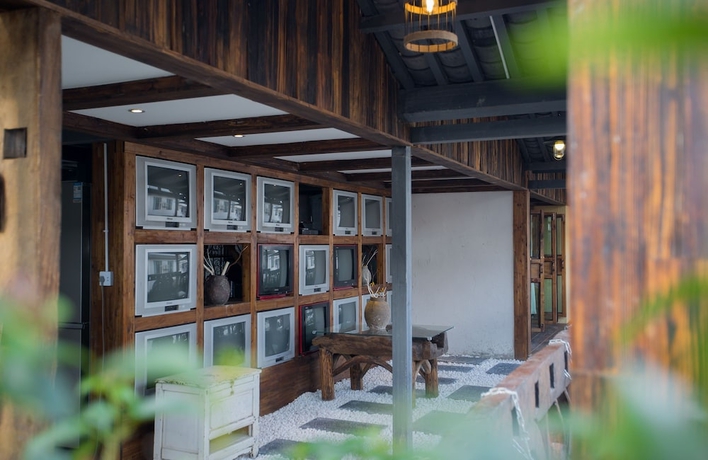 Imagen de la habitación del Hotel China Old Story Inn Lijiang Elite Garden. Foto 12