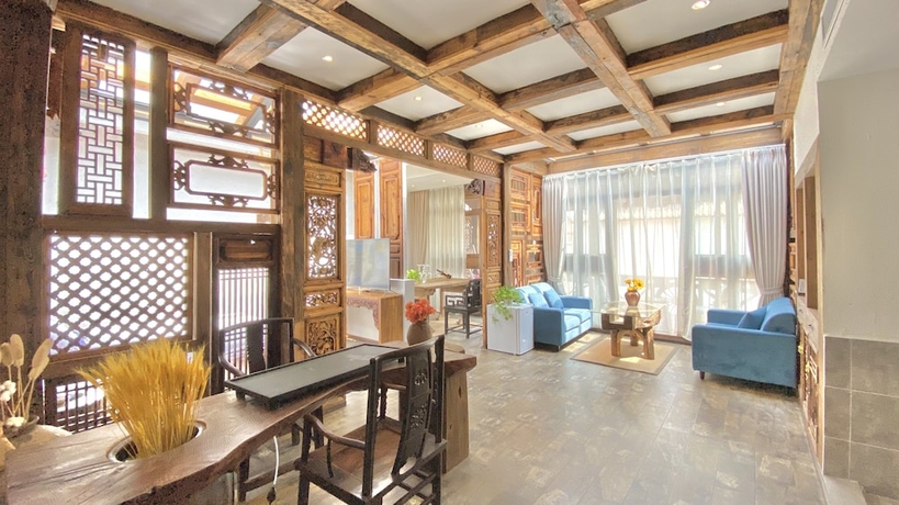 Imagen de la habitación del Hotel China Old Story Inn Lijiang Elite Garden. Foto 13