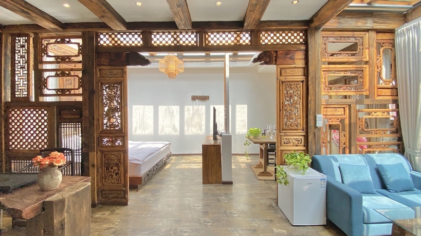 Imagen de la habitación del Hotel China Old Story Inn Lijiang Elite Garden. Foto 14