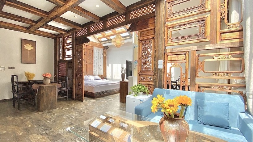 Imagen de la habitación del Hotel China Old Story Inn Lijiang Elite Garden. Foto 15