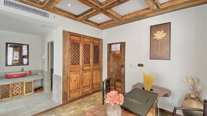 Imagen de la habitación del Hotel China Old Story Inn Lijiang Elite Garden. Foto 19