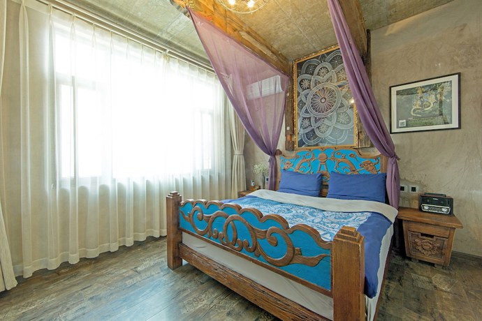 Imagen de la habitación del Hotel China Old Story Inns Dali Ancient Town. Foto 4