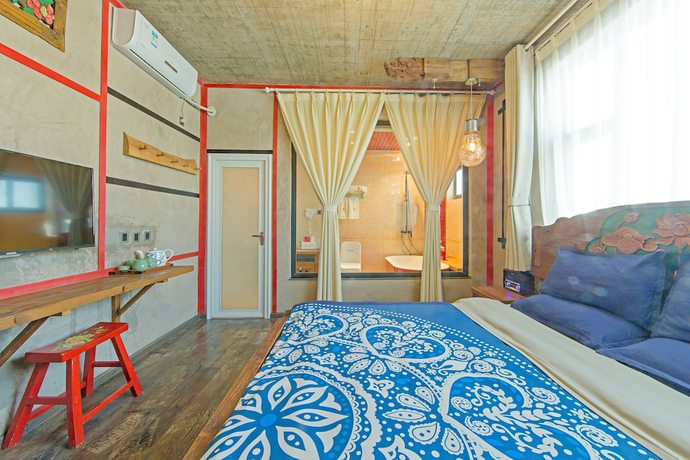 Imagen de la habitación del Hotel China Old Story Inns Dali Ancient Town. Foto 6