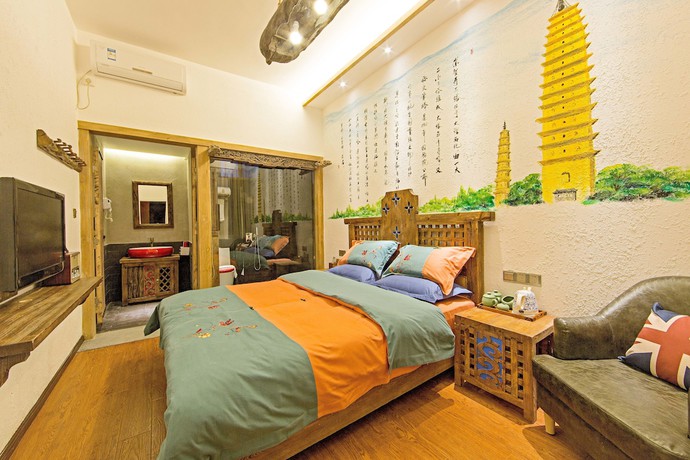 Imagen de la habitación del Hotel China Old Story Inns Dali Ancient Town. Foto 7