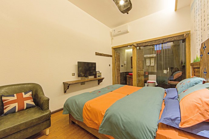 Imagen de la habitación del Hotel China Old Story Inns Dali Ancient Town. Foto 8