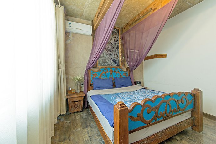 Imagen de la habitación del Hotel China Old Story Inns Dali Ancient Town. Foto 9