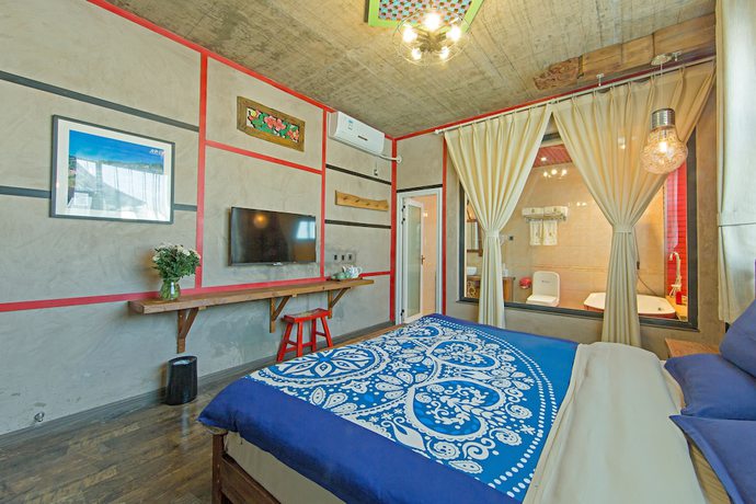 Imagen de la habitación del Hotel China Old Story Inns Dali Ancient Town. Foto 10