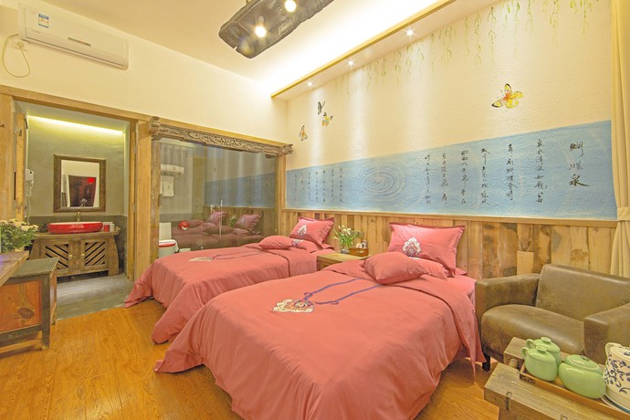 Imagen de la habitación del Hotel China Old Story Inns Dali Ancient Town. Foto 13