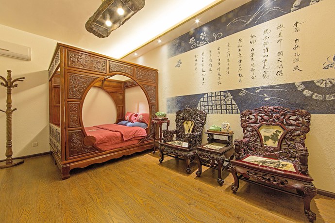 Imagen de la habitación del Hotel China Old Story Inns Dali Ancient Town. Foto 14