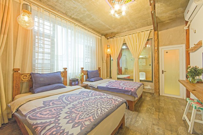 Imagen de la habitación del Hotel China Old Story Inns Dali Elite Garden. Foto 6