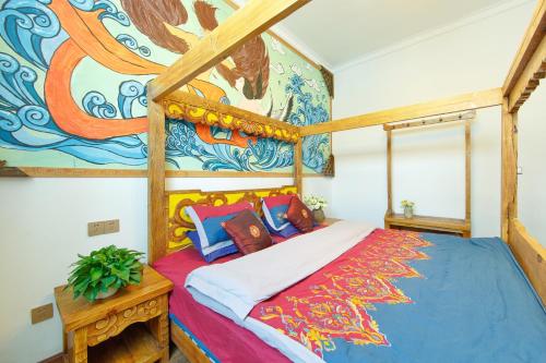 Imagen de la habitación del Hotel China Old Story Inns Encounter Lijiang. Foto 6