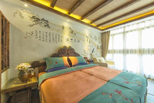 Imagen de la habitación del Hotel China Old Story Inns Encounter Lijiang. Foto 8