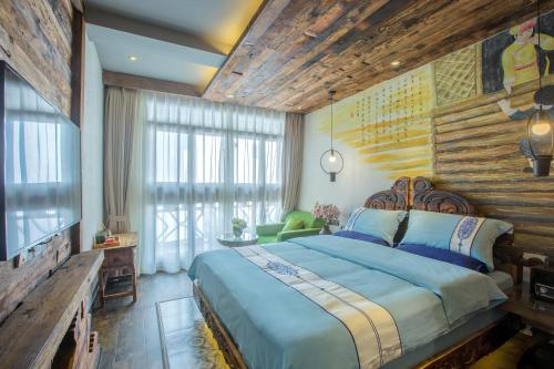 Imagen de la habitación del Hotel China Old Story Inns Lijiang Garden. Foto 9