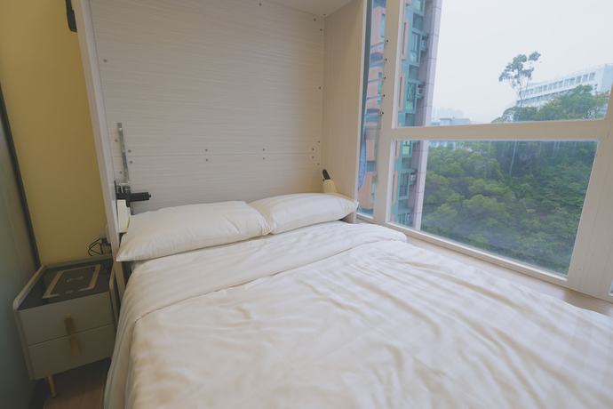 Imagen de la habitación del Hotel China Rich. Foto 10
