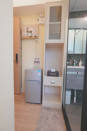 Imagen de la habitación del Hotel China Rich. Foto 17