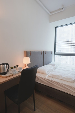 Imagen de la habitación del Hotel China Rich Oriental. Foto 10